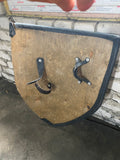 Duel shield with one part leather