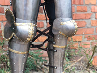 Titanium legs set with golden decoration