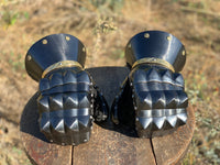 “Black Taurus” gauntlets with golden decoration (tempered steel)